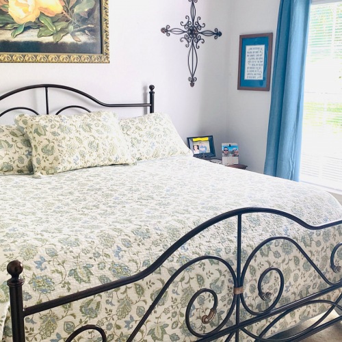 Bedroom large window floods bedroom with natural lighting