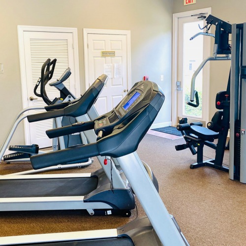 24-Hour Fitness brightly lit fitness center